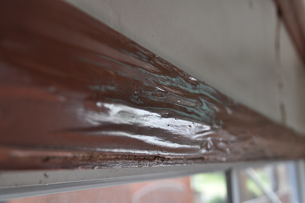 Rippled paint hiding termite damage